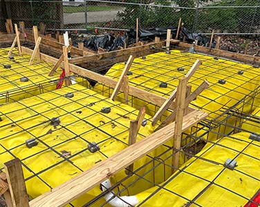 The foundation of a home, pictured before concrete has been poured. Get a new construction phase inspection from Sighthound Home Services